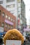 Hotteok or sweet Korean pancake with town in background.