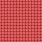 Houndstooth check pattern in reddish coral pink. Seamless spring autumn dog tooth background graphic for scarf, coat, dress.
