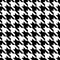 Houndstooth seamless pattern. Repeated houndtooth texture. Black hound tooth on white background. Repeating pepita plaid patern fo