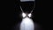 Hourglass on a Black Background. Close-up. Sand moves through the Sandglass