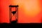 Hourglass Black Silhouette Orange Yellow Gradient Backgroud Passage of Time