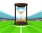 Hourglass countdown in the midfield of football stadium vector