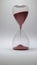 Hourglass falling sand and time passing.