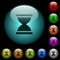 Hourglass icons in color illuminated glass buttons