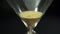 Hourglass in macro. Yellow sand in pouring ant time running out very fast. Black background. Concept. Time is money