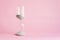 Hourglass on pink background