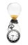 Hourglass with pocket watch on white