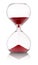 Hourglass with red sand running through