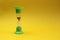 Hourglass stand on a yellow background