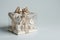 House as a gift. House architectural model in a gift box with a bow. Buying a new home, inherit real estate. Mortgage and home