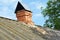 House asbestos rooftop with old brick damaged chimney