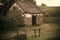 House barrack with old well in yard