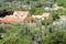 House based in vegetation with cacti on Hooiberg, Aruba