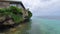 House Built Atop Rock by the Sea