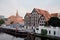 House in Bydgoszcz. Ancient building above the canal. Red brick building. Architecture. Architecture in the Polish city