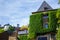 House with a climbing plant and the sky at the background in Clervaux, Luxembourg