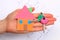House of colored paper and home keys in hand