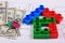 House of colorful building blocks, keys and banknotes on drawing