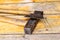 House construction arbors tool ax hammer heavy weathered metal head on wooden background