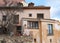 House in Cuenca with pomegranate tree on foreground