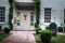 The house is decorated for Halloween: Pumpkins, on the door cast, the inscription and grave pita. Evening, Houston, Texas, United