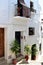 House decorated with plants in Frigiliana, Spanish white village Andalusia