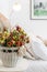 House decoration details white basket with flowers