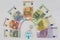 House and Euro Banknotes - Real Estate Investment