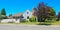 House exterior with brick chimney. Front yard view