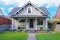 House exterior. Entrance porch and front yard view