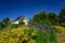 House exterior on a sunny day with a clear and blue sky.