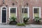 House Exterior Window Boxes Against Red Brick