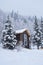 House in fir forest Teletsky Altai winter mountain ski resort