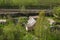 House with the garden near railway lines. wooden house in the forest aerial. rural landscape