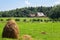 House, haystack, in the field, carpathian village, Ukraine