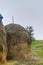 House, haystack in the field, in a carpathian village, Ukraine