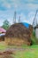 House, haystack in the field, in a carpathian village, Ukraine