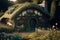 House of the hobbit hole. Fantasy Village Shire, houses with round doors and windows. The fabulous landscape of the Lord of the