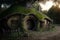 House of the hobbit hole. Fantasy Village Shire, houses with round doors and windows. The fabulous landscape of the Lord of the