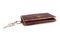 House key in an old leather keychain brown color