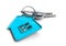 House keys with home icon keyring. Concept for owning a home.