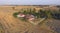 A house in a middle of dry paddy fields