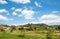 House on mountains and blue sky landscape