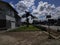 house neighbourhood town estate suburb city road architecture home street sky tree building downtown facade landmark