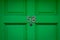 House number 58 on a dark green wooden front door