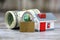 House, padlock and dollars. Conceptual image for investors in real estate and dollars. Security of money and real estate