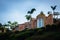 House and palm trees on a cliff in La Jolla, California.