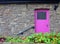 A house with a pink door in Mountshannon, County Clare, Ireland