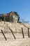 House with poles erosion at Beach