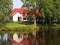 House reflected in lake